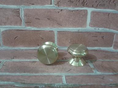 Brass Handle code N.053D size wide 32 mm high 27 mm.