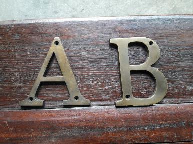 Brass Letter A-B size high 10 cm. Thickness 5 mm.