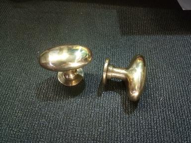 Brass handle Item Code OVAL.050 size long 61 mm.wide 34 mm.Thick 24 mm.high 49 mm. base 35 mm.