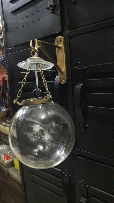 Brass wall lamp round glass