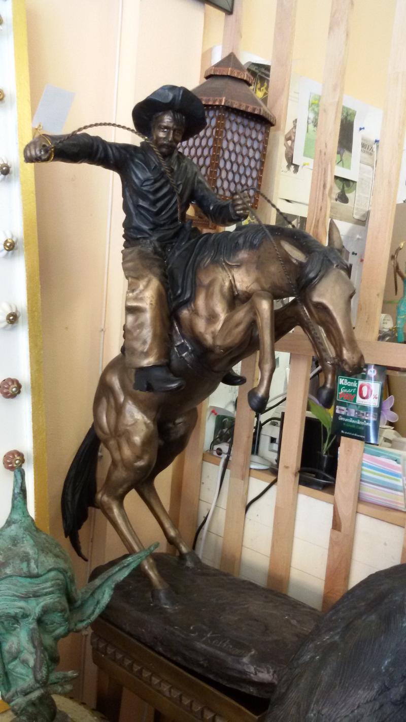 Horse statue brass with cowboy  Item code  SBT04 size long 65 cm. wide 40 cm high 85 cm.